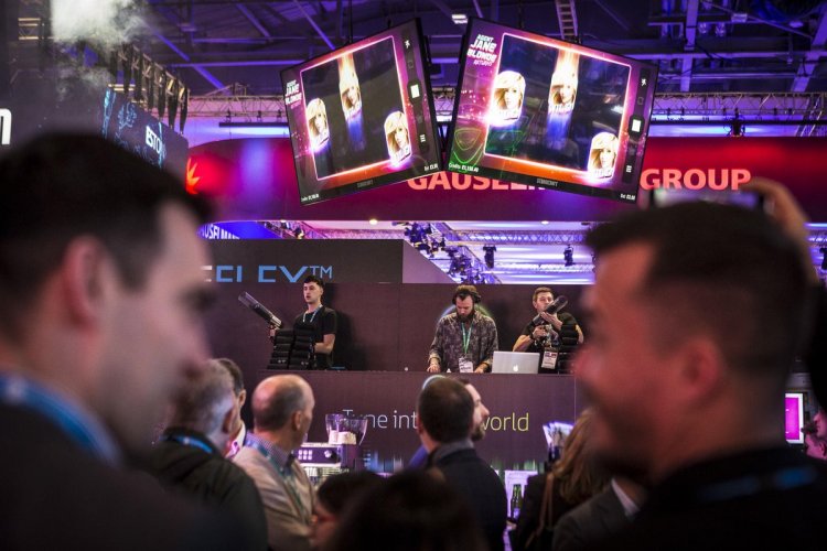 Microgaming draw crowds to their stand at ICE London with T-shirt cannons and 1000 T-shirts to give away